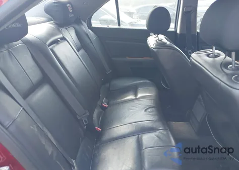 2010 Cadillac Sts Premium Package z USA, uszkodzony, nr VIN 1G6DU6EVXA0106117